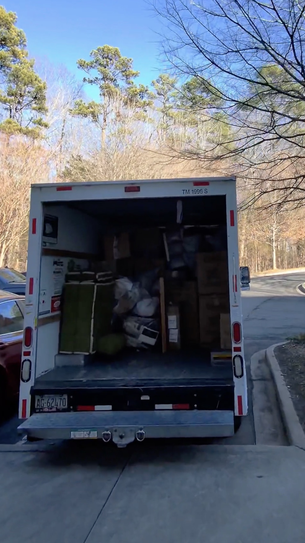 Loaded moving truck packed with boxes and furniture, ready for delivery